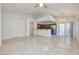 Spacious open living area with tile floors and seamless flow into kitchen and dining areas at 1705 King James St # 203, Las Vegas, NV 89144