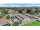An aerial view showcasing a large lot, mature trees, plus a workshop and an in-ground pool at 1919 Belcastro St, Las Vegas, NV 89117