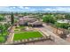 Beautiful, luxurious home with a long driveway, an manicured lawn and mountain views at 1919 Belcastro St, Las Vegas, NV 89117
