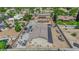 An aerial view of the home showing a large workshop with parking, solar panels and a pool at 1919 Belcastro St, Las Vegas, NV 89117