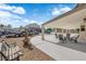 Backyard patio area with seating and lush landscaping at 1919 Belcastro St, Las Vegas, NV 89117
