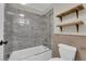 Bathroom with a glass-enclosed shower, modern tile, and open shelving at 1919 Belcastro St, Las Vegas, NV 89117