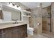 Beautiful bathroom with designer vanity and step-in shower with custom tile at 1919 Belcastro St, Las Vegas, NV 89117