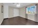 Bedroom with hardwood floors, natural light, and large closet at 1919 Belcastro St, Las Vegas, NV 89117