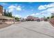 Spacious driveway leading to a large garage, ideal for car enthusiasts and outdoor vehicles and equipment at 1919 Belcastro St, Las Vegas, NV 89117