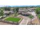 Stunning two-story home featuring an expansive driveway, a manicured lawn, and mature landscaping at 1919 Belcastro St, Las Vegas, NV 89117