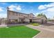 Charming two-story home with a well-manicured lawn, mature trees and a two car garage at 1919 Belcastro St, Las Vegas, NV 89117