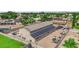 Aerial view of a large warehouse-style building with solar panels on the roof at 1919 Belcastro St, Las Vegas, NV 89117