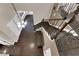 Spacious foyer with dark wood floors, staircase, and decorative chandelier at 1919 Belcastro St, Las Vegas, NV 89117
