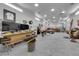 Interior of a large garage featuring high ceilings, ample lighting, and space for vehicle repairs and projects at 1919 Belcastro St, Las Vegas, NV 89117