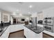 Well-appointed kitchen boasts granite countertops, stainless appliances, and ample cabinet space at 1919 Belcastro St, Las Vegas, NV 89117