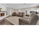 Inviting living room with a fireplace, neutral color palette, and plush seating at 1919 Belcastro St, Las Vegas, NV 89117
