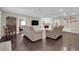 Comfortable living space with a cozy fireplace and lots of seating at 1919 Belcastro St, Las Vegas, NV 89117