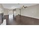 Open living room with hardwood floors, a fireplace, and French doors with ample natural light at 1919 Belcastro St, Las Vegas, NV 89117