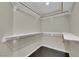 Walk-in closet with custom shelving at 1919 Belcastro St, Las Vegas, NV 89117