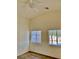 This bright room features laminate flooring, white ceiling fan and a window with blinds at 2050 N Los Feliz St # 114, Las Vegas, NV 89156