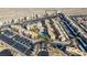 High-angle view of condos featuring a community pool, parking, and well-manicured grounds at 2068 Mesquite Ln # 203, Laughlin, NV 89029