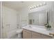 Bright bathroom offers a tub-shower, vanity, and neutral finishes at 2068 Mesquite Ln # 203, Laughlin, NV 89029