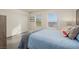 Bright bedroom featuring dual windows and a comfortable bed with scenic views at 2068 Mesquite Ln # 203, Laughlin, NV 89029