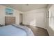 Bedroom featuring closet, a bed, and a dresser in a well-lit room at 2068 Mesquite Ln # 203, Laughlin, NV 89029