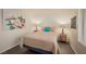 Serene bedroom with art, a cozy bed, and natural light from the window at 2068 Mesquite Ln # 203, Laughlin, NV 89029