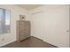 Bedroom with wood-look floors, a dresser, and a large closet at 2068 Mesquite Ln # 203, Laughlin, NV 89029