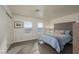 Bright bedroom with a cozy bed, two windows offering natural light and outdoor views at 2068 Mesquite Ln # 203, Laughlin, NV 89029