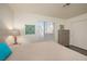 Bedroom with a window, wood-look floors, and a spacious closet at 2068 Mesquite Ln # 203, Laughlin, NV 89029
