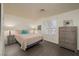 Comfortable bedroom with wood-look floors, ample lighting, and a cozy bed at 2068 Mesquite Ln # 203, Laughlin, NV 89029