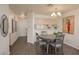 Inviting dining room featuring a gray table set, pendant lighting and views of the living room at 2068 Mesquite Ln # 203, Laughlin, NV 89029