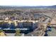 Exterior shot of condo buildings with desert landscaping, carports, and distant mountain views at 2068 Mesquite Ln # 203, Laughlin, NV 89029