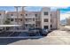 Condominium building with exterior staircases, covered parking, and desert landscaping at 2068 Mesquite Ln # 203, Laughlin, NV 89029