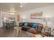 Open-concept living area with a brown sofa, bar seating, and access to the kitchen at 2068 Mesquite Ln # 203, Laughlin, NV 89029
