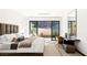 Stylish bedroom with modern furniture, comfortable bedding, and private outdoor access at 21 Rockstream Dr, Henderson, NV 89012