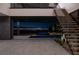 Modern staircase with city views at dusk at 21 Rockstream Dr, Henderson, NV 89012