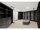 Large walk-in closet with custom shelving, drawers, and ample storage space at 21 Rockstream Dr, Henderson, NV 89012