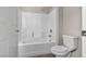 Bathroom featuring a shower-over-tub combination and white fixtures at 2175 Limestone Cove Ct, Laughlin, NV 89029
