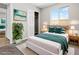 Bedroom showcasing a comfortable bed, stylish decor, and natural light at 2175 Limestone Cove Ct, Laughlin, NV 89029