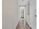 Hallway with tile flooring and arched doorways, creating a sense of depth at 2175 Limestone Cove Ct, Laughlin, NV 89029