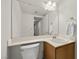 Functional bathroom with a vanity, sink, large mirror and neutral decor at 2344 Valleywood St, Henderson, NV 89014