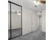 Bedroom featuring mirrored closet doors and neutral carpet at 2344 Valleywood St, Henderson, NV 89014
