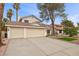 Charming two-story home with a three car garage and desert landscaping at 2344 Valleywood St, Henderson, NV 89014