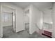 Hallway with bedroom views and carpeted staircase at 2344 Valleywood St, Henderson, NV 89014