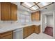 Bright kitchen with tile countertops and wood cabinets at 2344 Valleywood St, Henderson, NV 89014