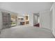 Open-concept living area with a sliding glass door and dining area near the kitchen at 2344 Valleywood St, Henderson, NV 89014