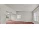 Bright living room with multiple windows and red carpet at 2344 Valleywood St, Henderson, NV 89014