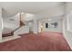 Bright living room features the staircase to the upper level at 2344 Valleywood St, Henderson, NV 89014