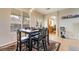 Cozy dining area with a stylish table set, backyard views, and ample natural light at 2354 Buffalo Run Ave, Las Vegas, NV 89123