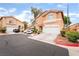 Inviting two-story home with a two-car garage and well-maintained landscaping at 2354 Buffalo Run Ave, Las Vegas, NV 89123