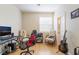Office space with a large desk, rolling chair, and window at 2354 Buffalo Run Ave, Las Vegas, NV 89123